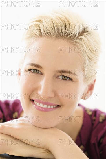 Portrait of young woman indoors.