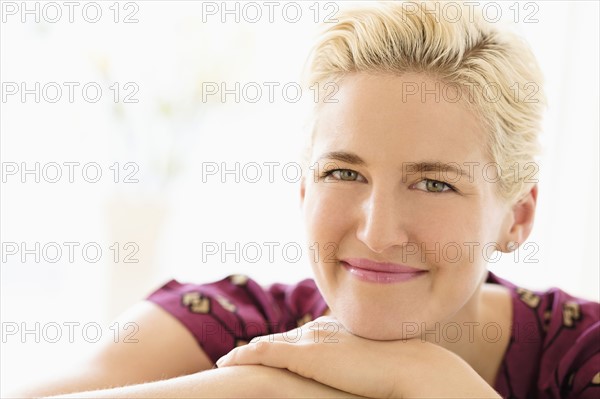 Portrait of young woman indoors.