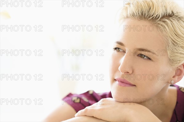 Portrait of young woman indoors.