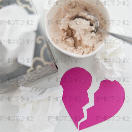 Wet facial tissues and ice cream on table