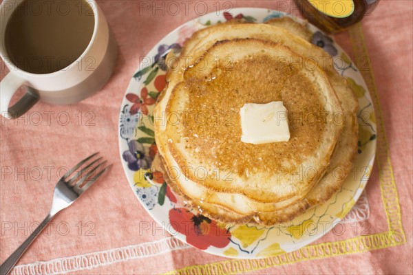 Breakfast with coffee and pancakes