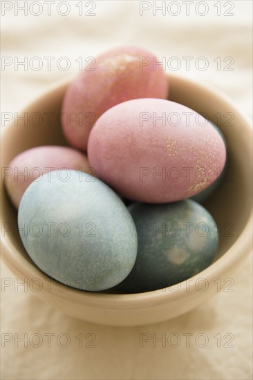 Studio shot of dyed eggs in bowl