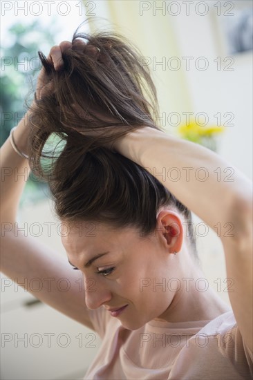 Woman doing her hair