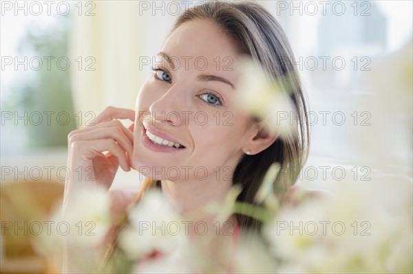 Portrait of smiling woman at home