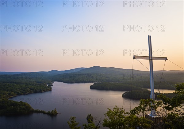Landscape with cross at dusk