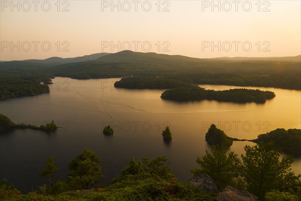 Landscape with lake at sunset