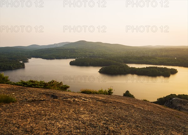 Landscape with lake at sunset