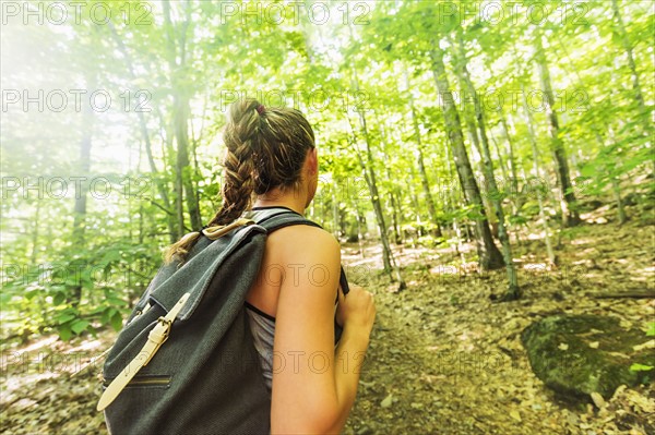 Female hiker in forest