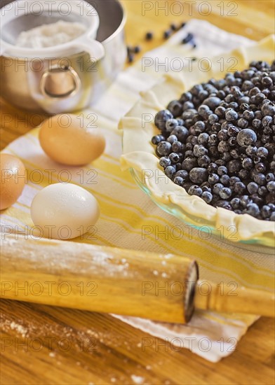 Ingredients for berry pie on table