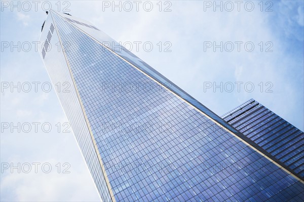 Low angle view of One World Trade Center against sky