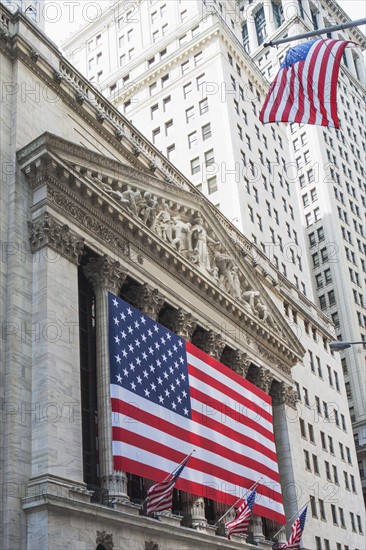 American flag on facade of New York Stock Exchange building