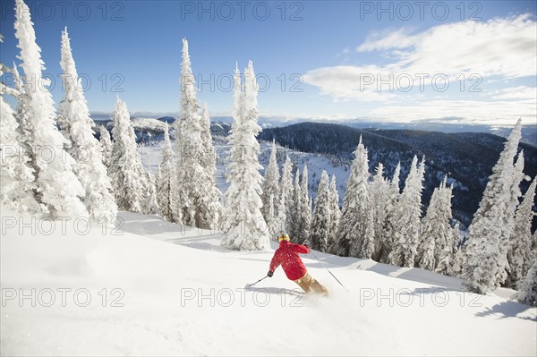 Man skiing downhill