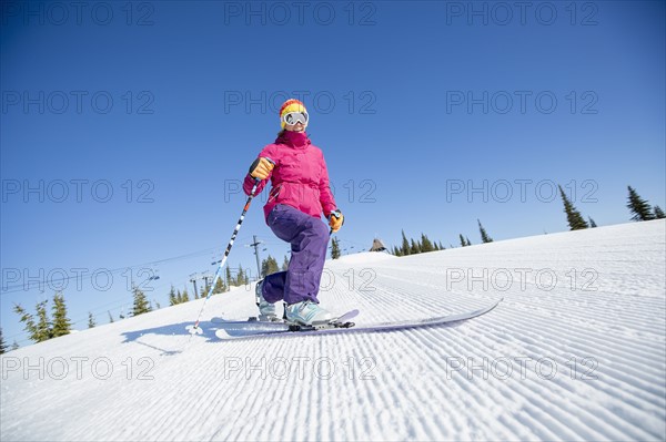 Woman skiing downhill