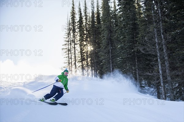 Man skiing downhill