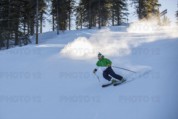 Man skiing downhill