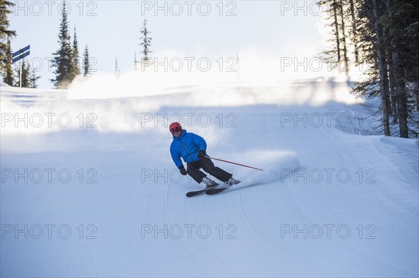 Man skiing downhill