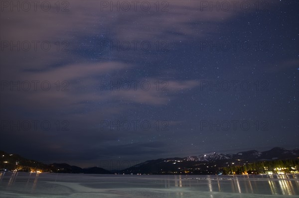 Frozen Whitefish Lake at night