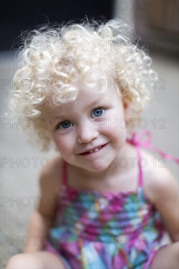 Portrait of smiley blonde girl (4-5)