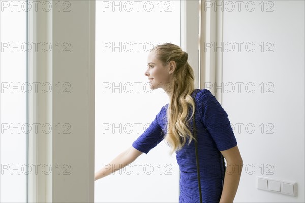 Woman opening door