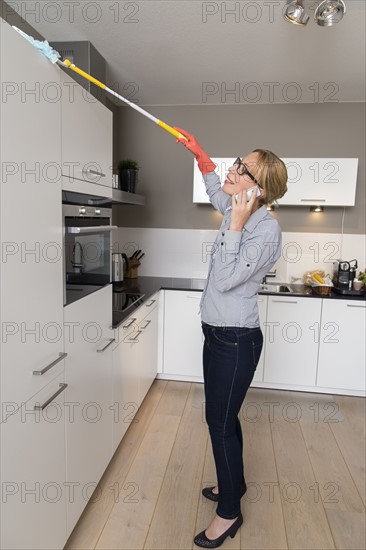 Woman cleaning house