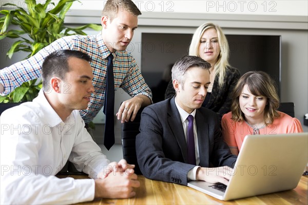 Man showing presentation on laptop