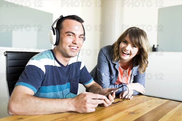 Office workers smiling