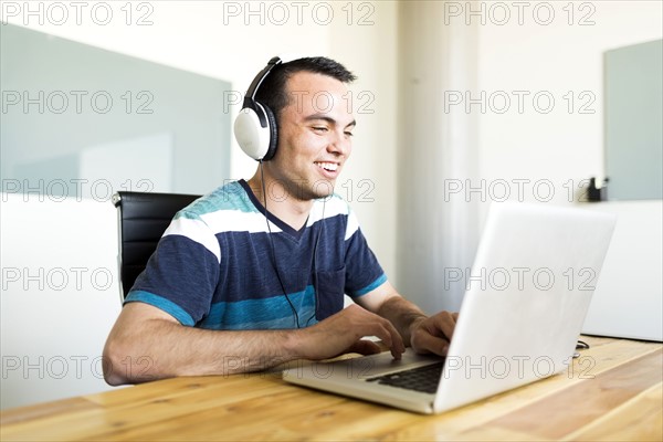 Office worker using laptop