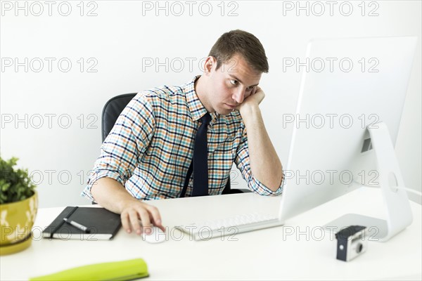 Young man working in office