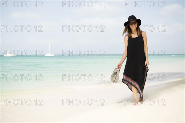 Woman walking on beach