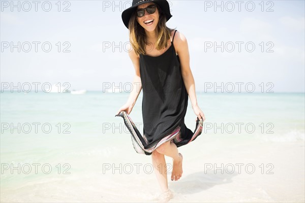 woman walking on beach