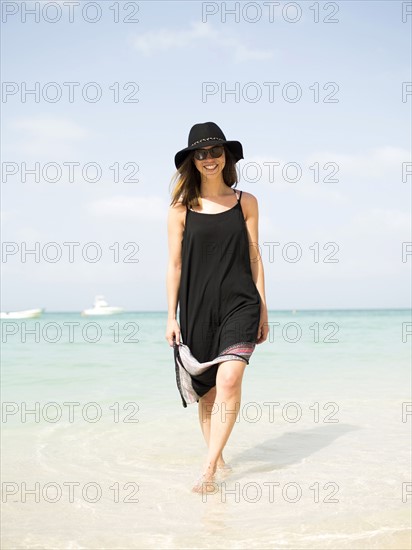 Woman walking on beach