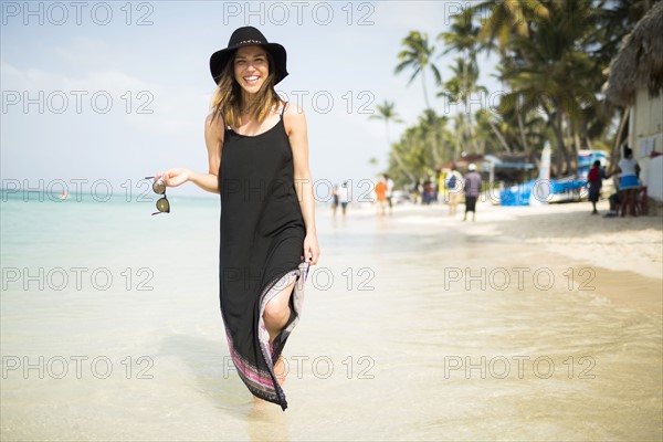 Woman walking on beach