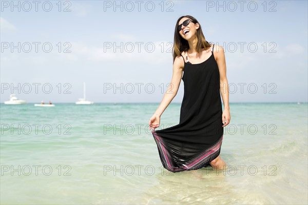 Woman walking on beach