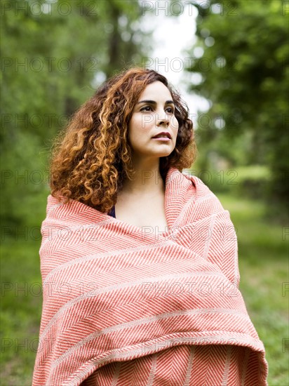 Woman covered with blanket
