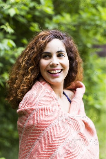 Woman covered with blanket