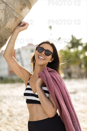 Woman smiling on beach