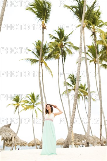 Woman in dress on beach