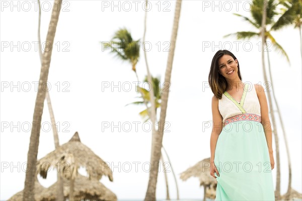 Woman in dress on beach