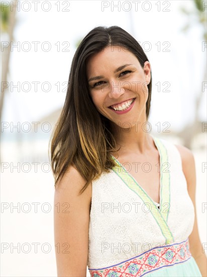 Woman in dress on beach