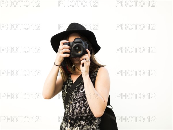 Woman taking photos during vacations