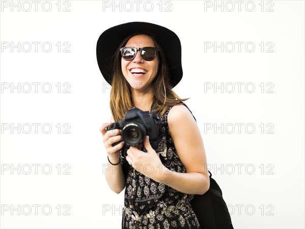 Woman taking photos during vacations