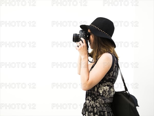 Woman taking photos during vacations