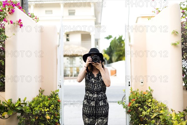 Woman taking photos during vacations