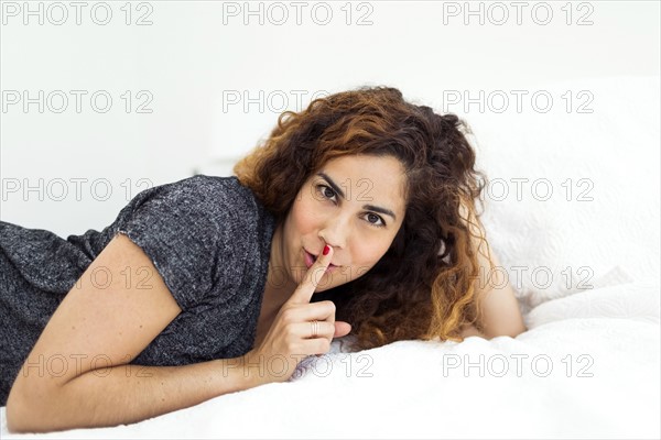 Woman lying in bed