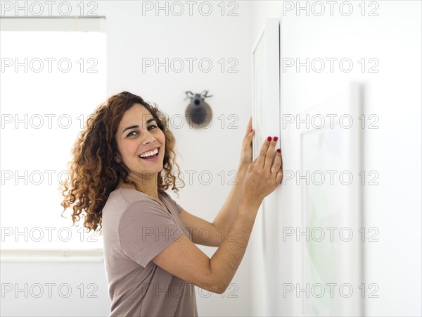 Woman decorating room