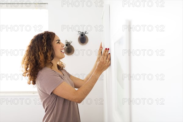 Woman decorating room