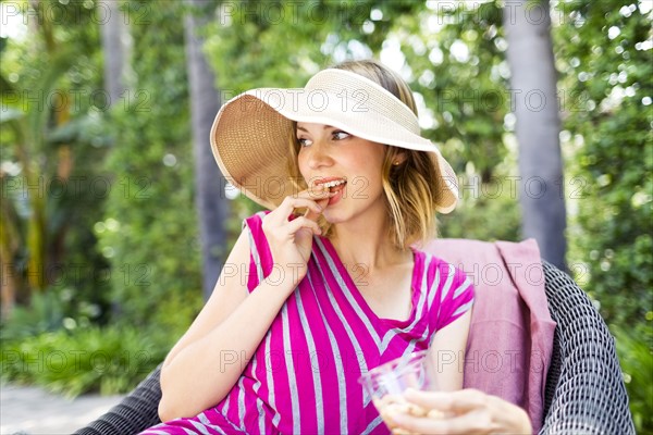 Woman eating snacks