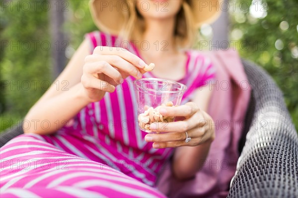 Woman holding snacks