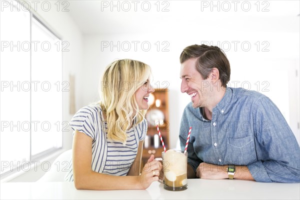 Couple spending time at home and drinking beer