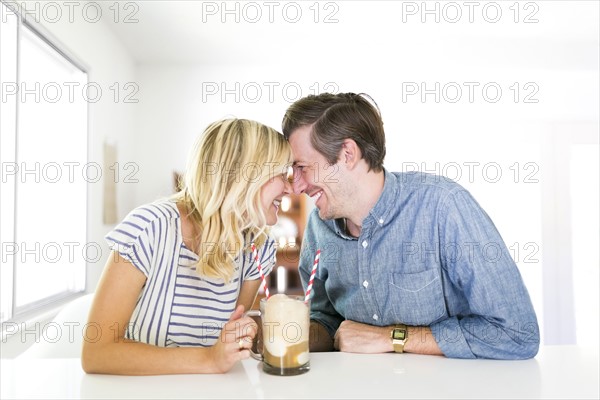 Couple spending time at home and drinking beer